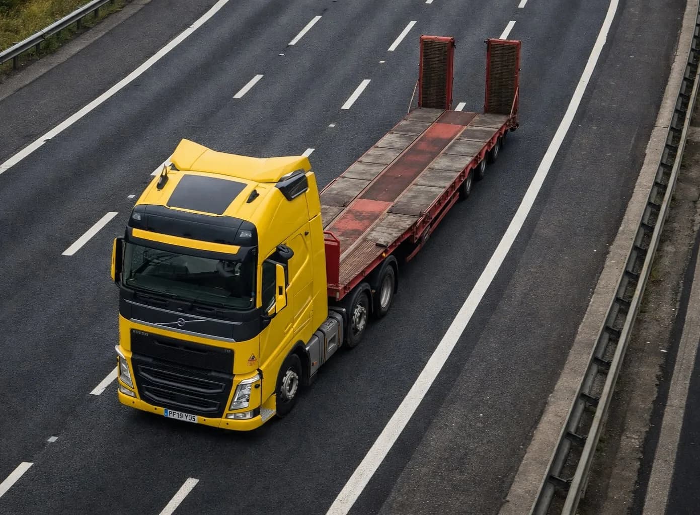 Malway Logistics low loader travelling on a divided UK road