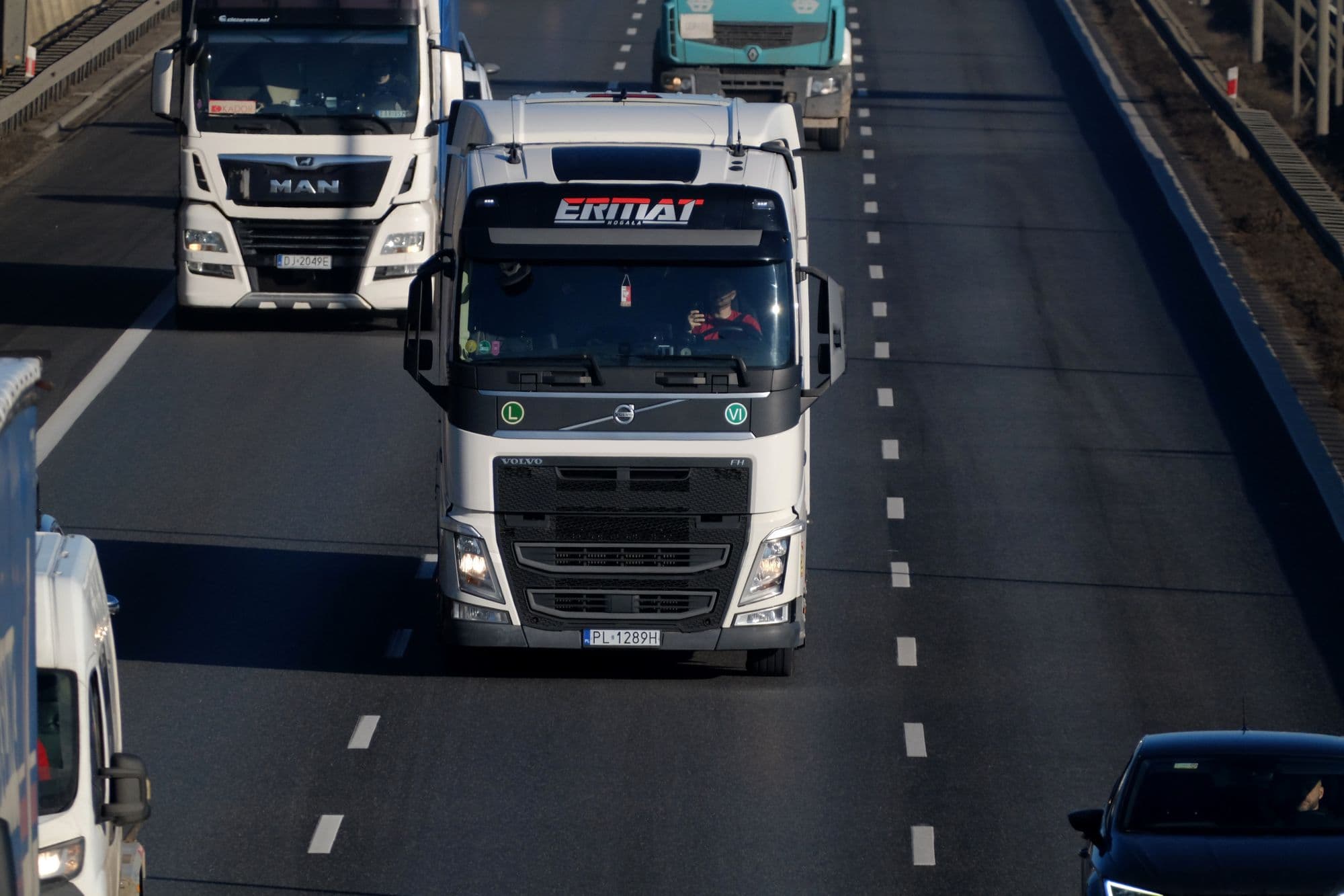 Heavy goods vehicles travelling together on a motorway